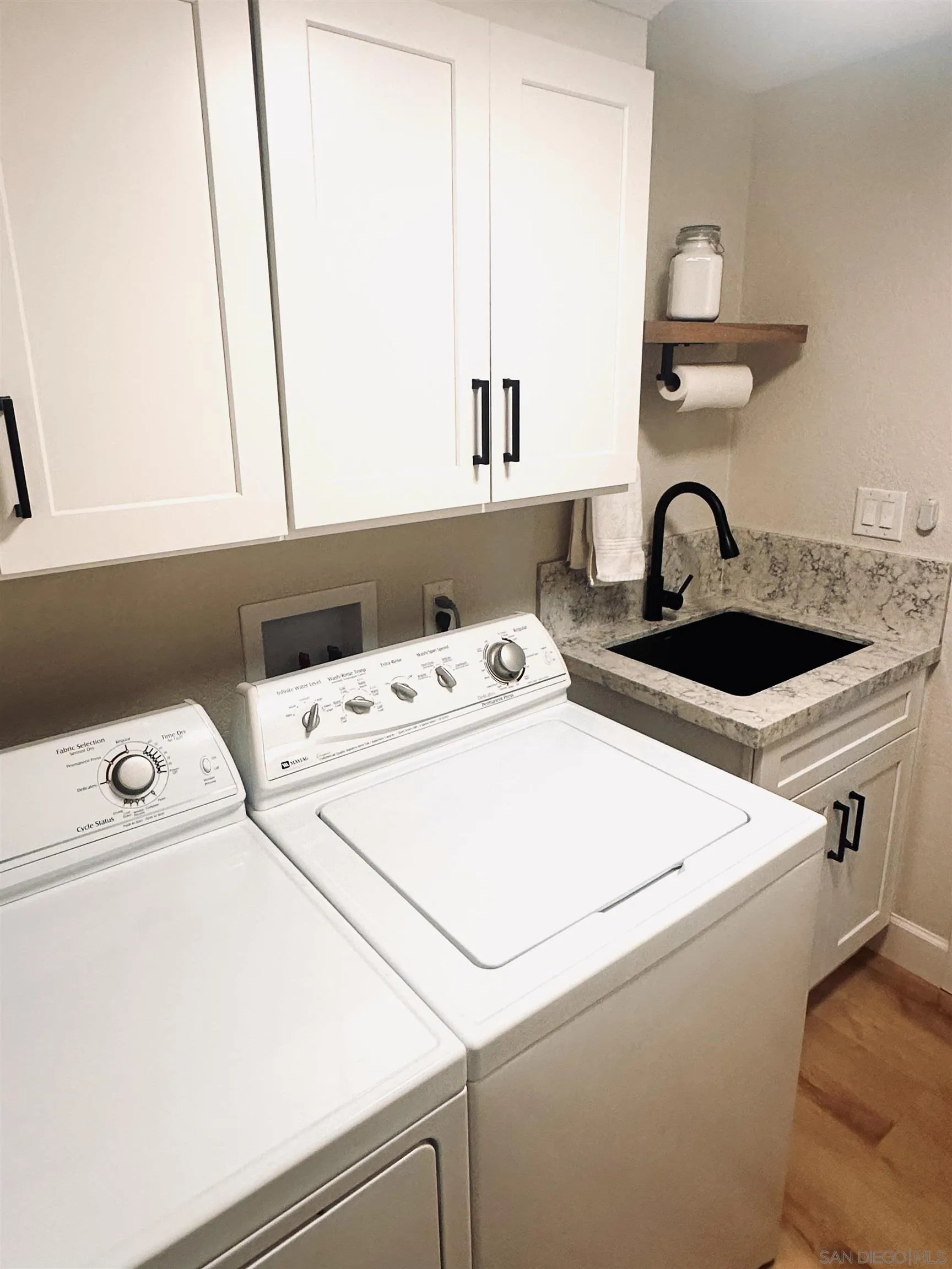 1259 Natoma Way, Unit C Oceanside, CA 92057 - Photo 24 of 52 a utility room with dryer and washer