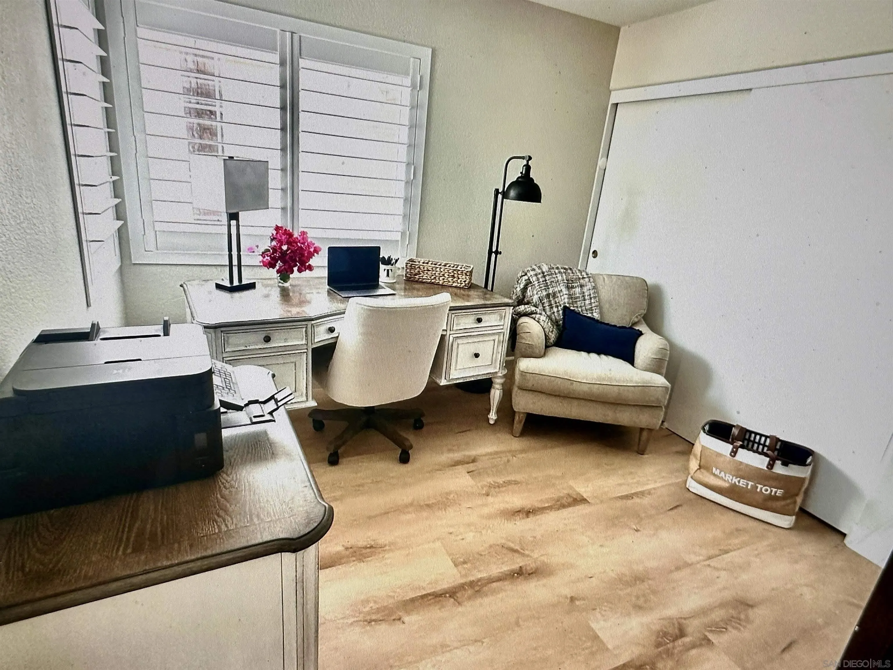 1259 Natoma Way, Unit C Oceanside, CA 92057 - Photo 31 of 52 a living room with furniture and a potted plant
