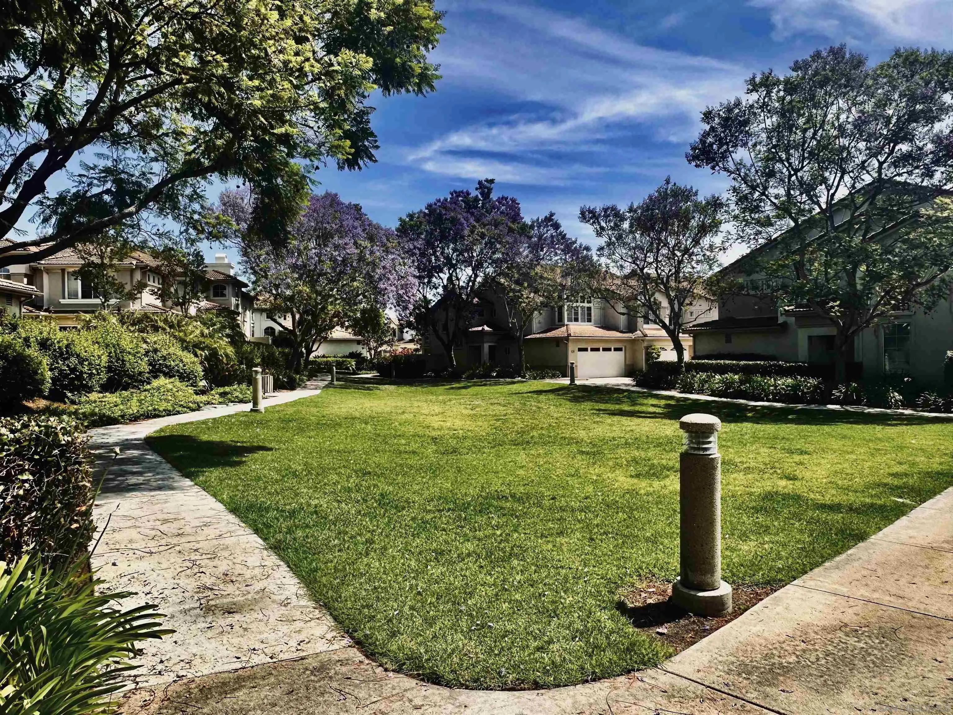 1259 Natoma Way, Unit C Oceanside, CA 92057 - Photo 45 of 52 a view of a park with large trees