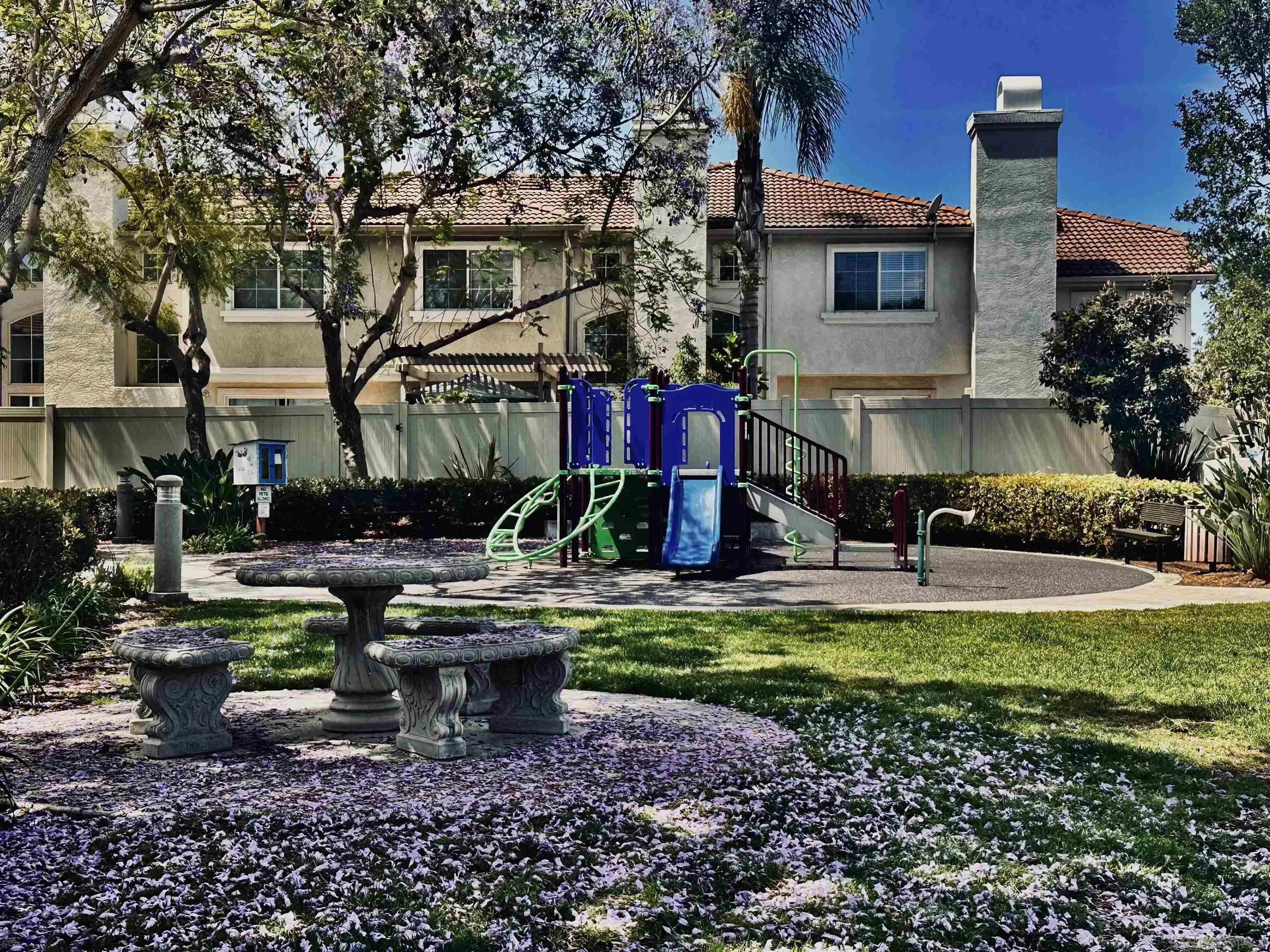 1259 Natoma Way, Unit C Oceanside, CA 92057 - Photo 47 of 52 a view of a house with backyard and sitting area