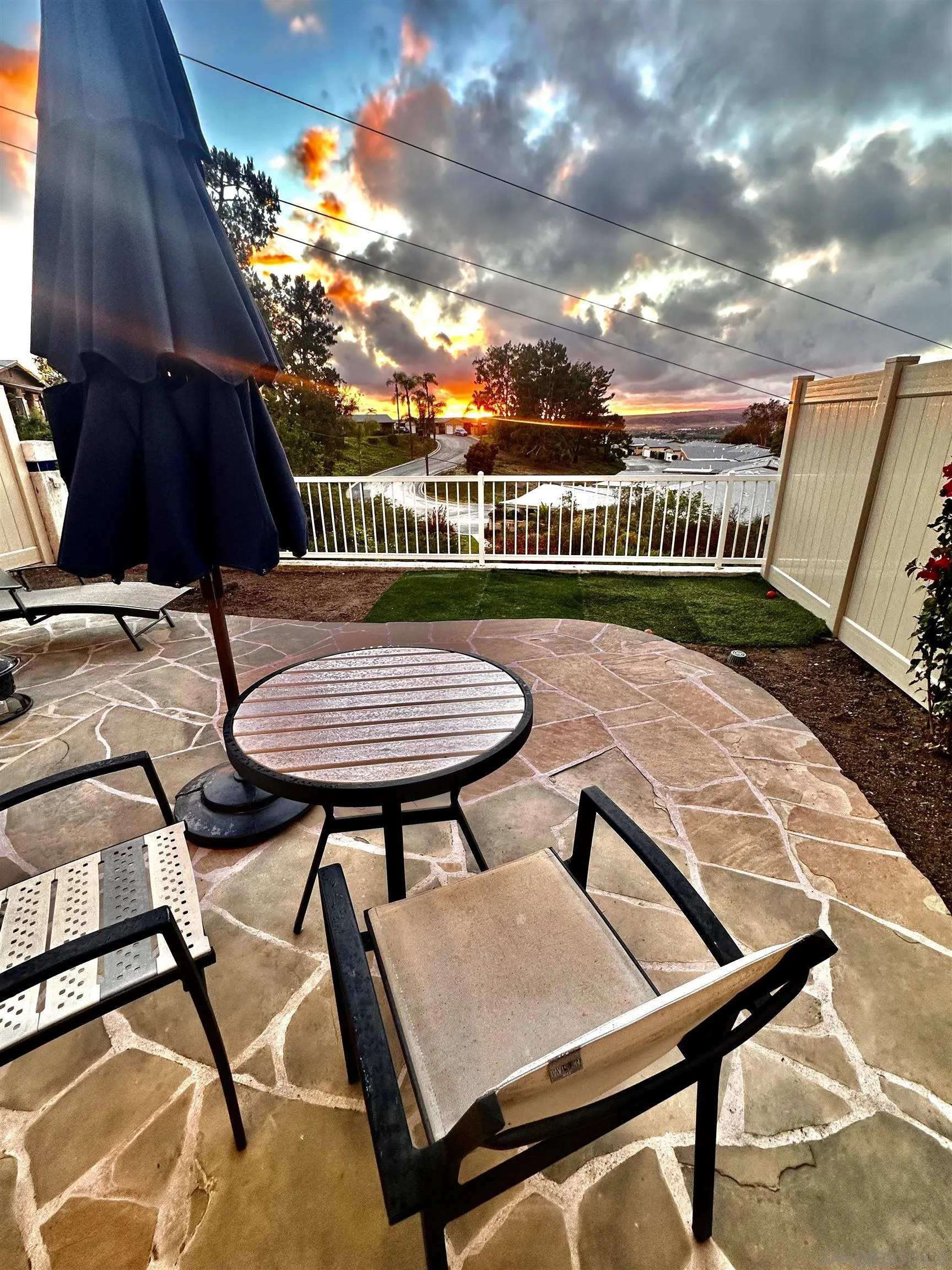 1259 Natoma Way, Unit C Oceanside, CA 92057 - Photo 7 of 52 a terrace with outdoor seating and city view