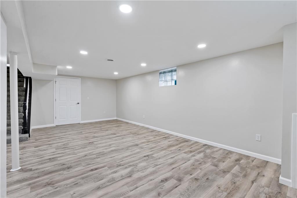 951 Shenango Road Beaver Falls, PA 15010 - Photo 17 of 25 a view of empty room with wooden floor