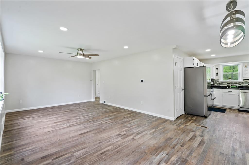 951 Shenango Road Beaver Falls, PA 15010 - Photo 8 of 25 a view of a kitchen with a sink and cabinets