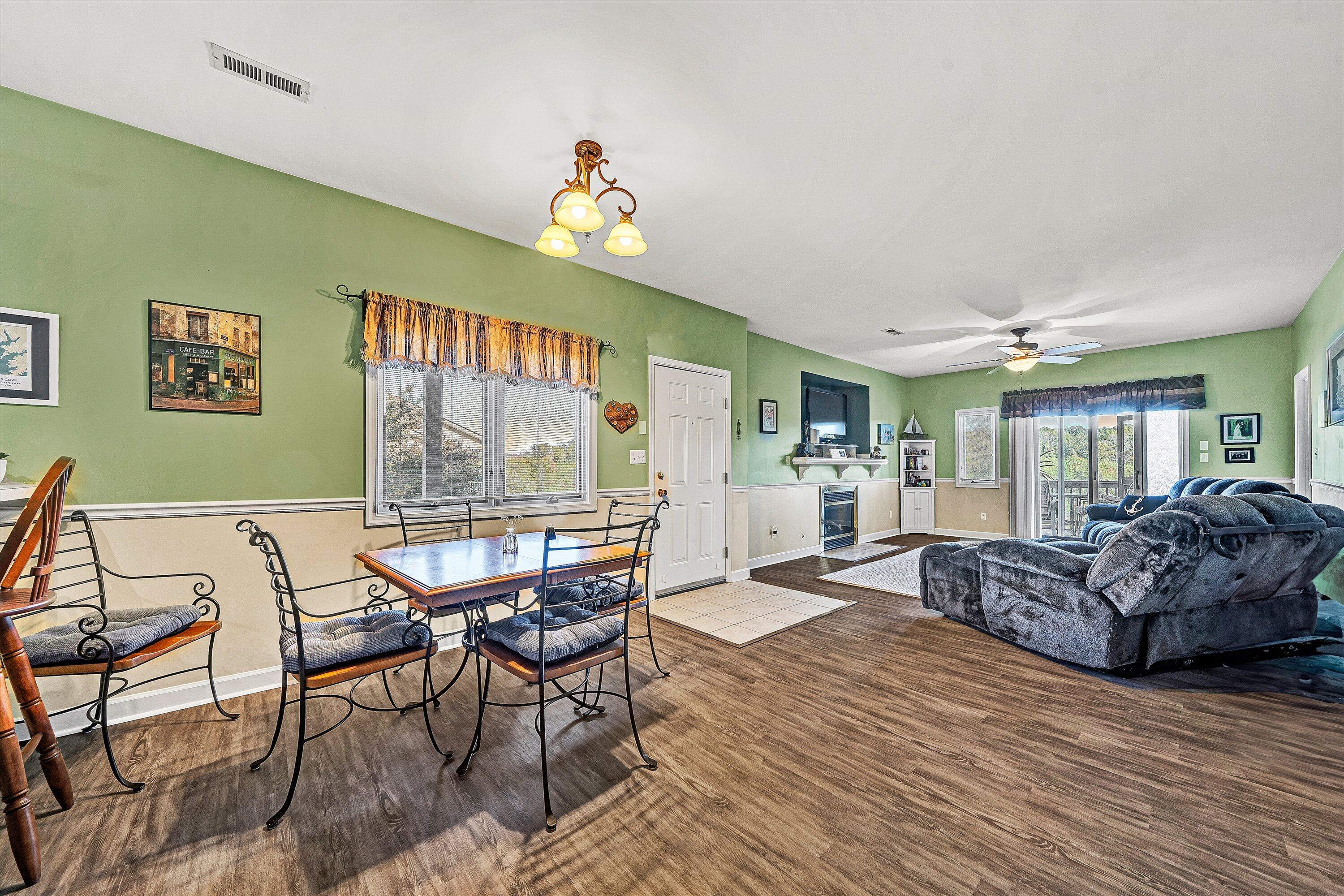 1103 Mariners Way, Unit 1 Huddleston, VA 24104 - Photo 11 of 27 a view of a dining room with furniture window and outside view