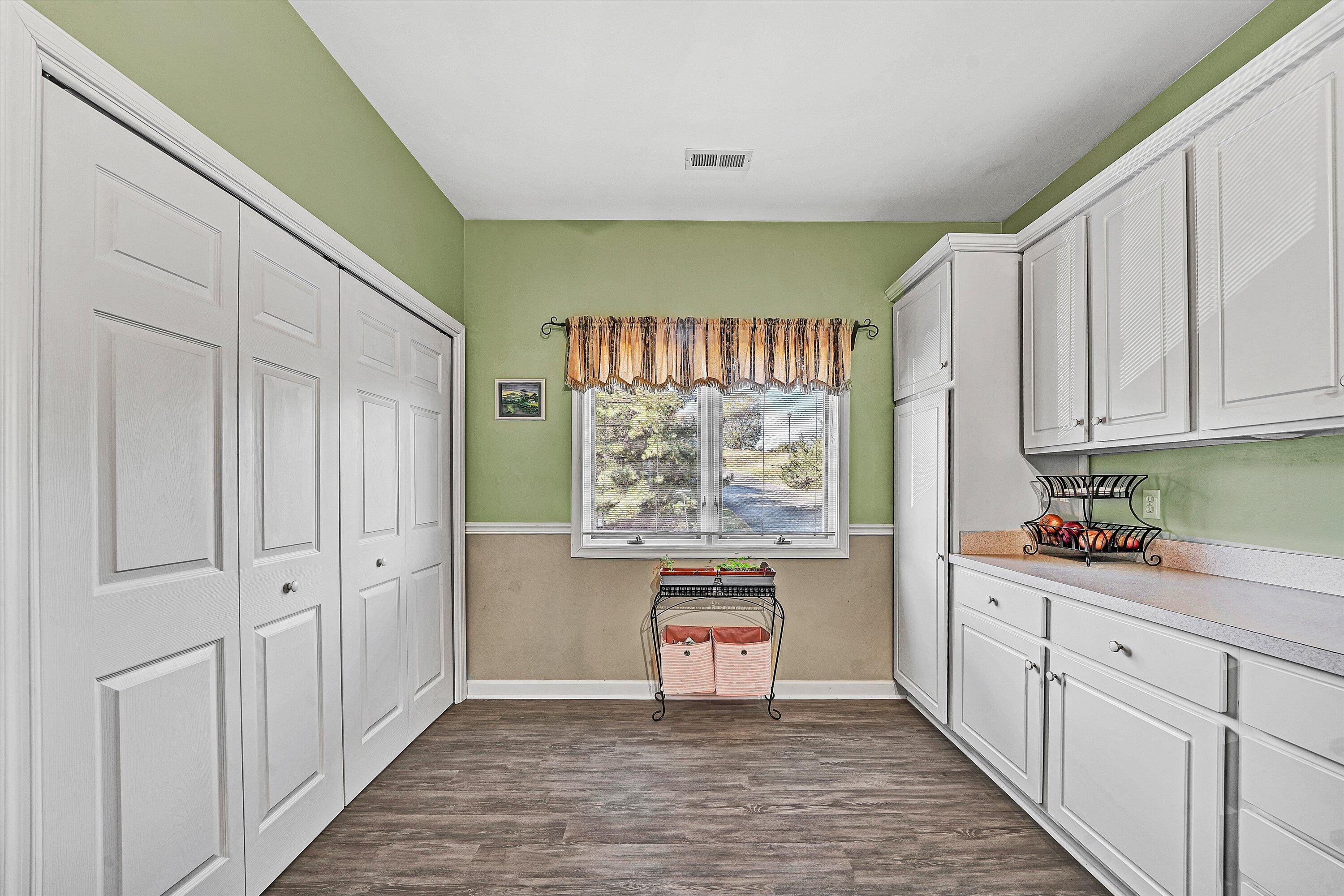 1103 Mariners Way, Unit 1 Huddleston, VA 24104 - Photo 14 of 27 a kitchen with stainless steel appliances granite countertop a refrigerator and a stove top oven