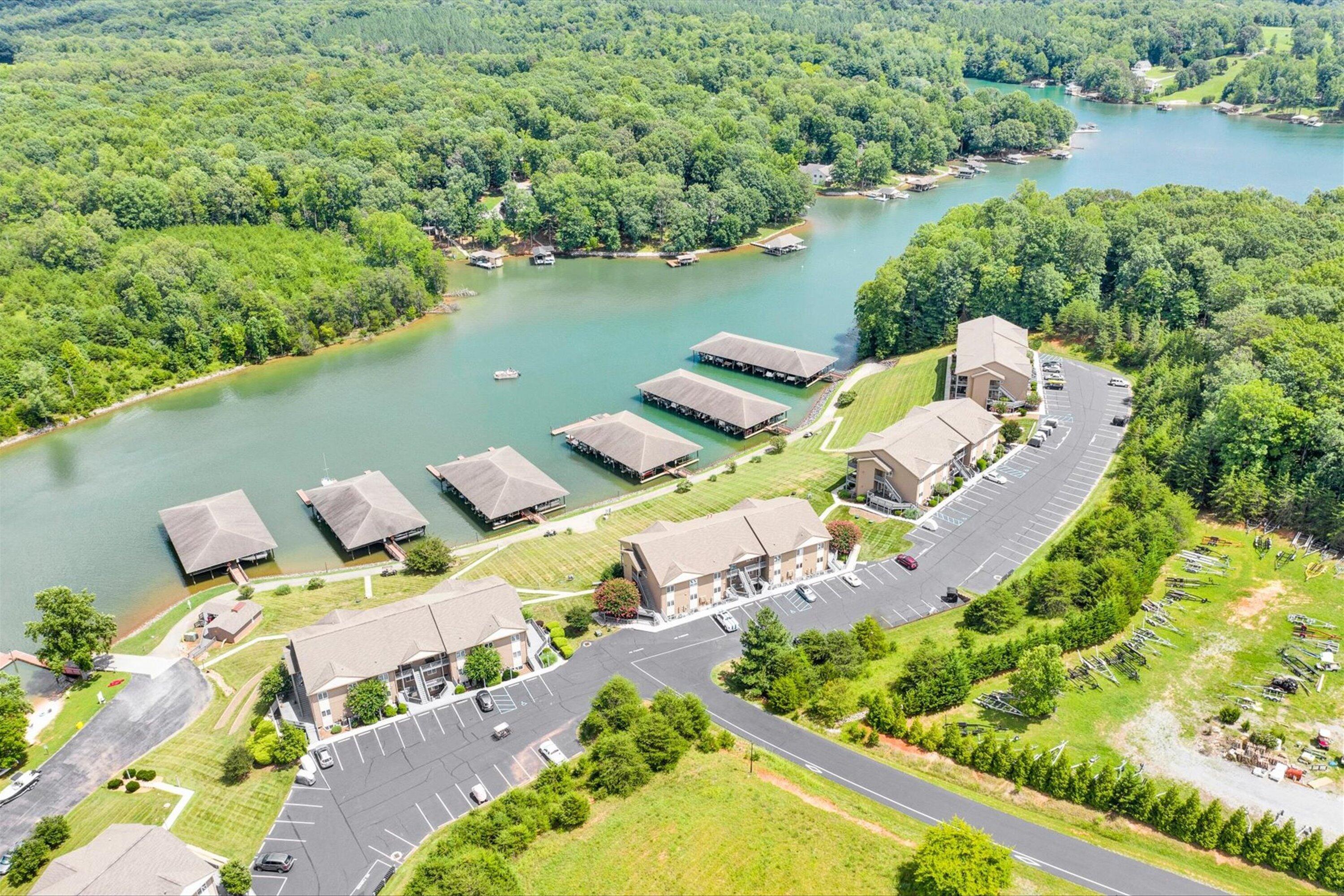 1103 Mariners Way, Unit 1 Huddleston, VA 24104 - Photo 2 of 27 an aerial view of a house with outdoor space and lake view