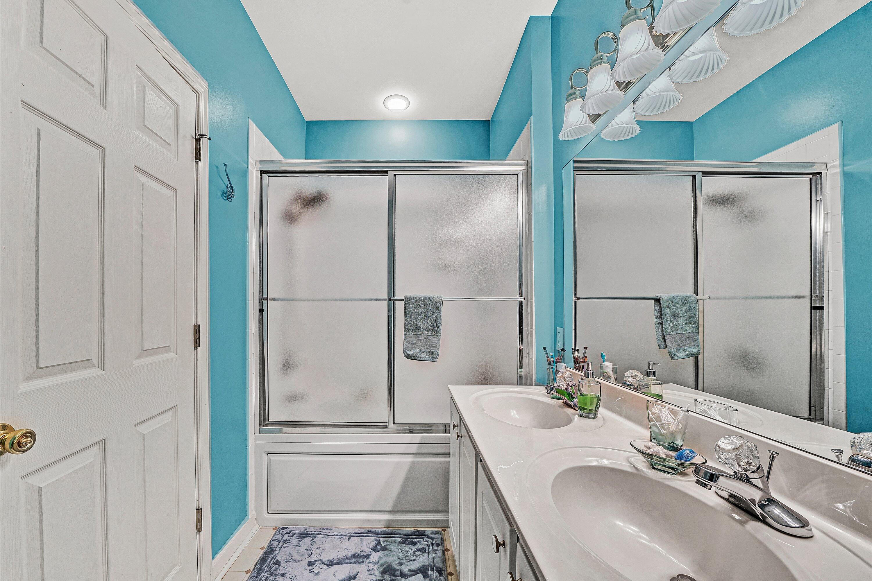 1103 Mariners Way, Unit 1 Huddleston, VA 24104 - Photo 21 of 27 a bathroom with a sink and a mirror