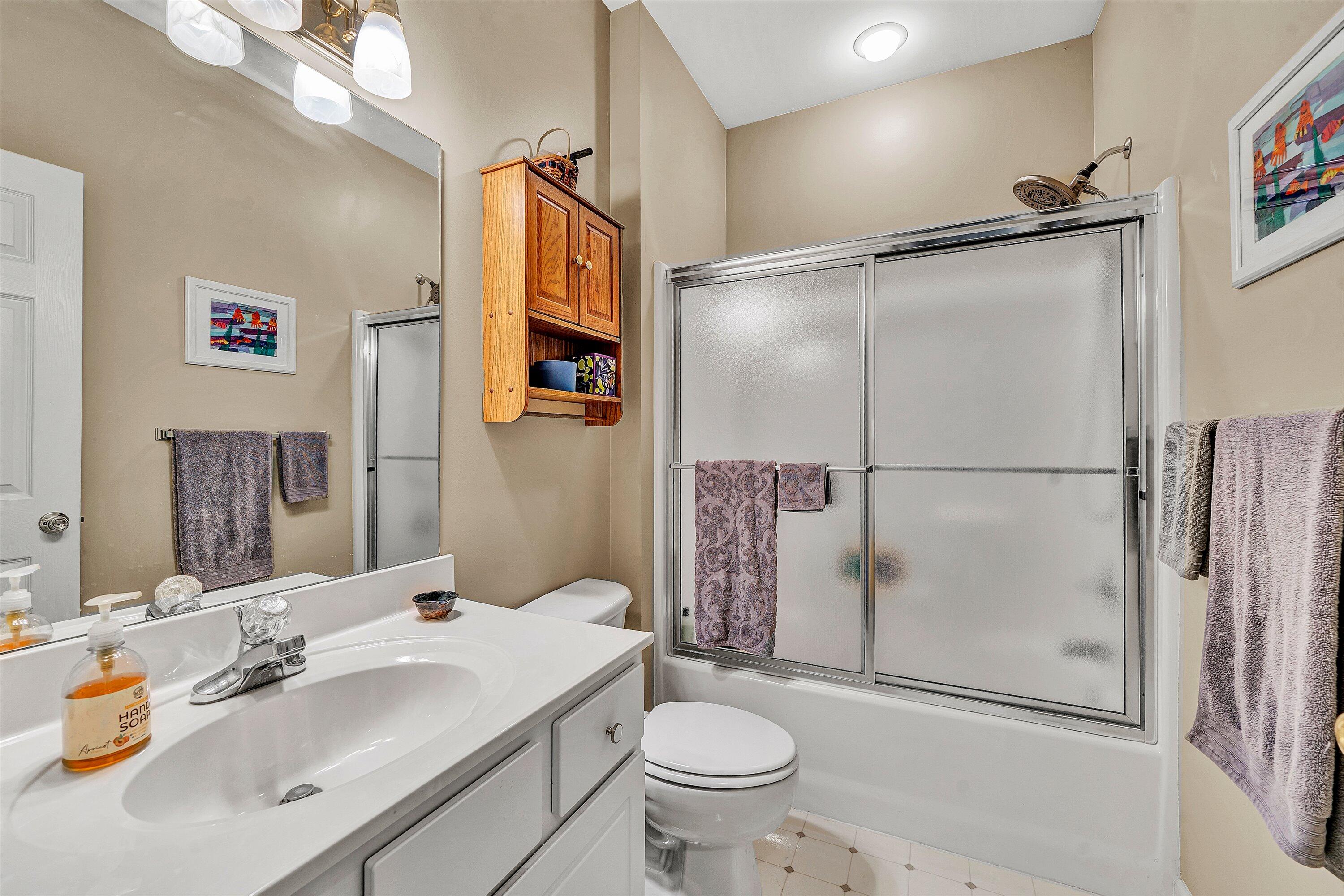 1103 Mariners Way, Unit 1 Huddleston, VA 24104 - Photo 23 of 27 a bathroom with a sink toilet and shower
