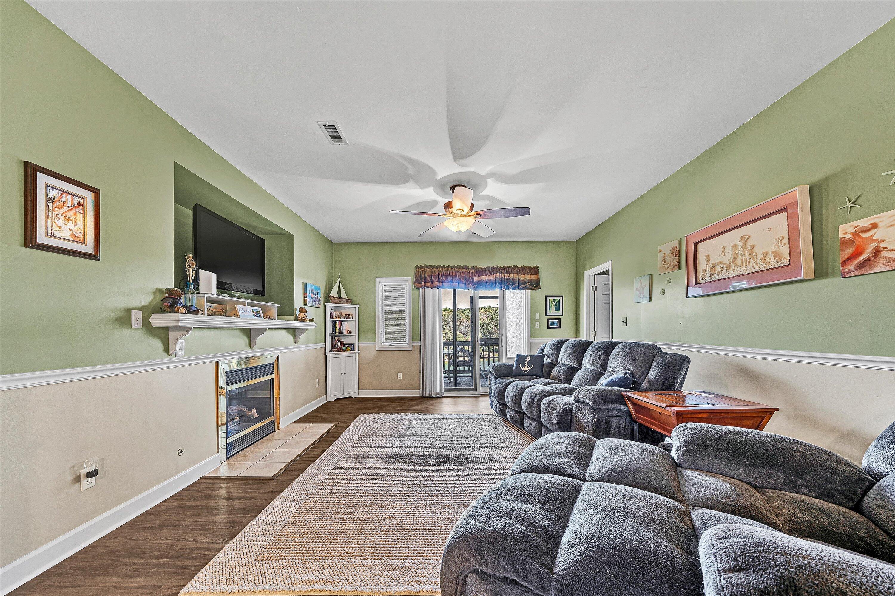 1103 Mariners Way, Unit 1 Huddleston, VA 24104 - Photo 5 of 27 a living room with furniture and a flat screen tv