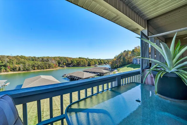 a view of a lake from a balcony
