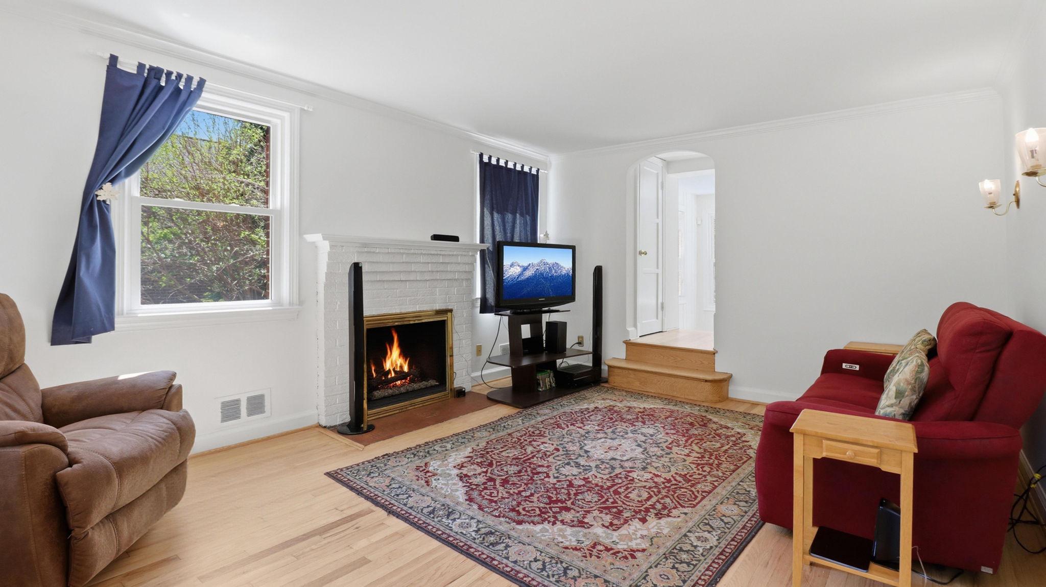 11708 Galt Avenue Silver Spring, MD 20902 - Photo 8 of 25 Cozy living space with inviting gas fireplace.