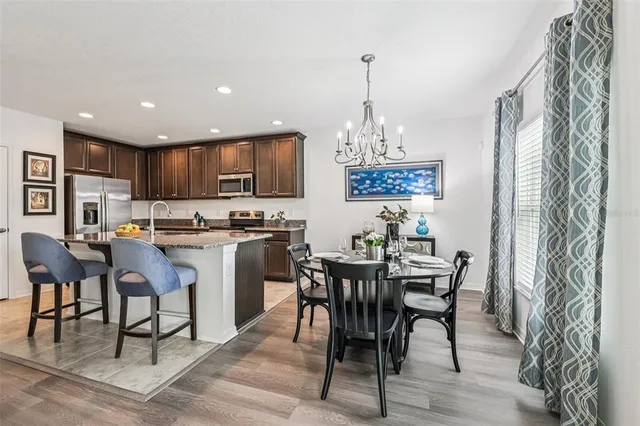 a view of a dining room with furniture