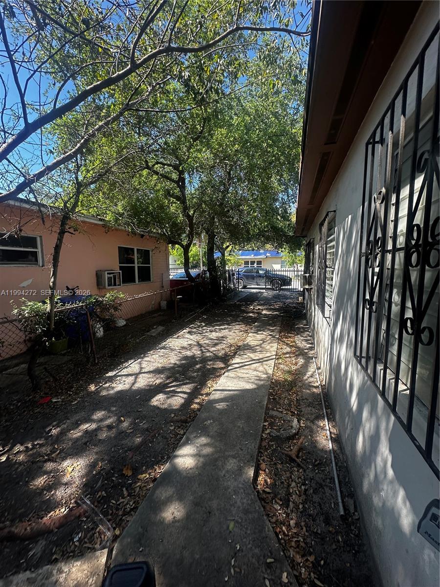 112 Northeast 63rd Street, Unit 112 Miami, FL 33138 - Photo 18 of 18 a view of yard with patio