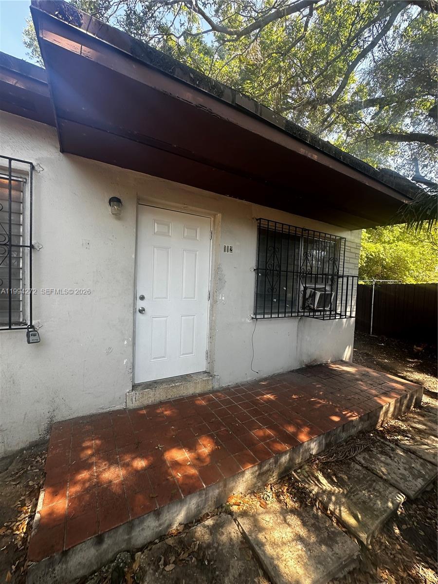 112 Northeast 63rd Street, Unit 112 Miami, FL 33138 - Photo 3 of 18 a backyard of a house