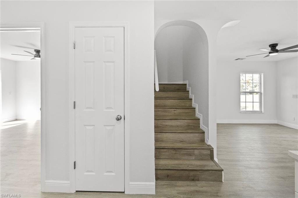 Undisclosed Address Naples, FL 34113 - Photo 13 of 21 a view of entryway with wooden floor