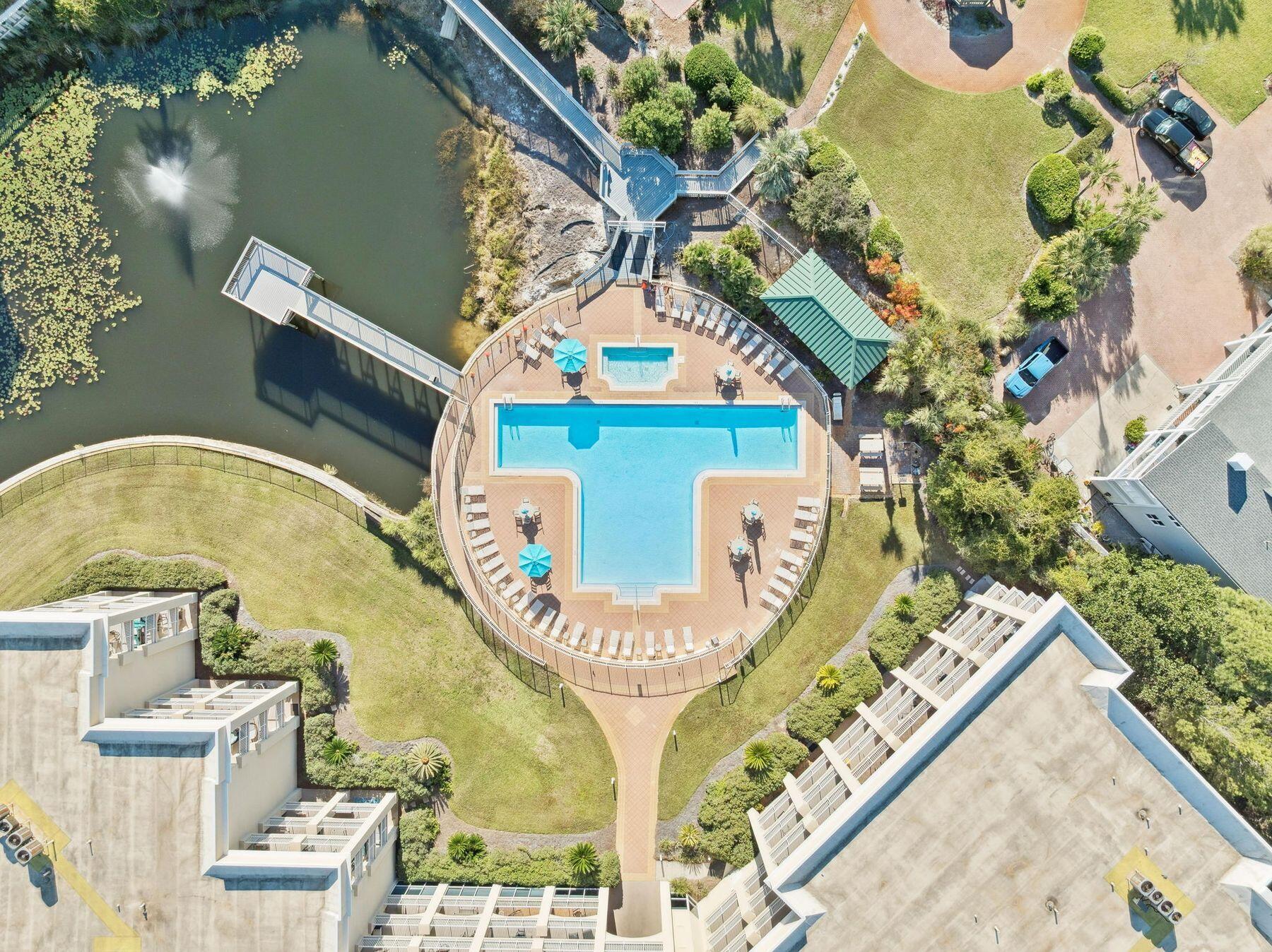 4045 West County Highway 30A, Unit 402 Santa Rosa Beach, FL 32459 - Photo 15 of 20 an aerial view of a swimming pool with a fountain