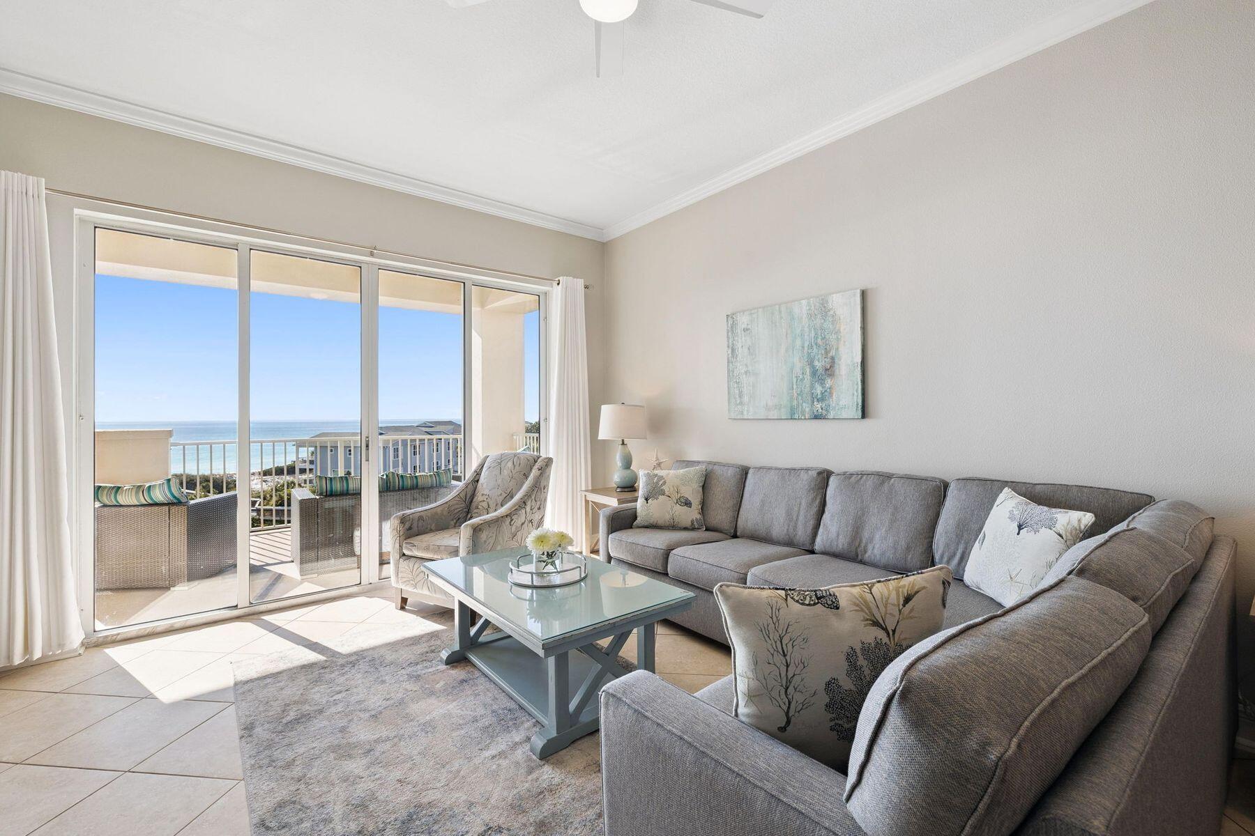4045 West County Highway 30A, Unit 402 Santa Rosa Beach, FL 32459 - Photo 3 of 20 a living room with furniture and a large window