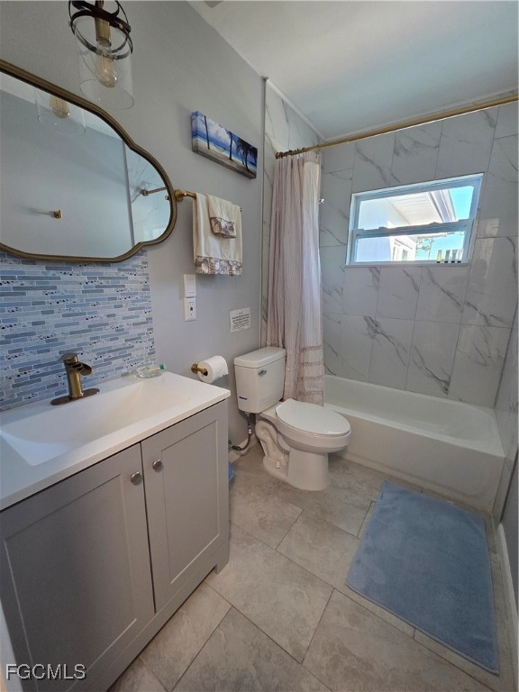 8141 Cleaves Road North Fort Myers, FL 33903 - Photo 20 of 37 a bathroom with a sink a toilet and shower