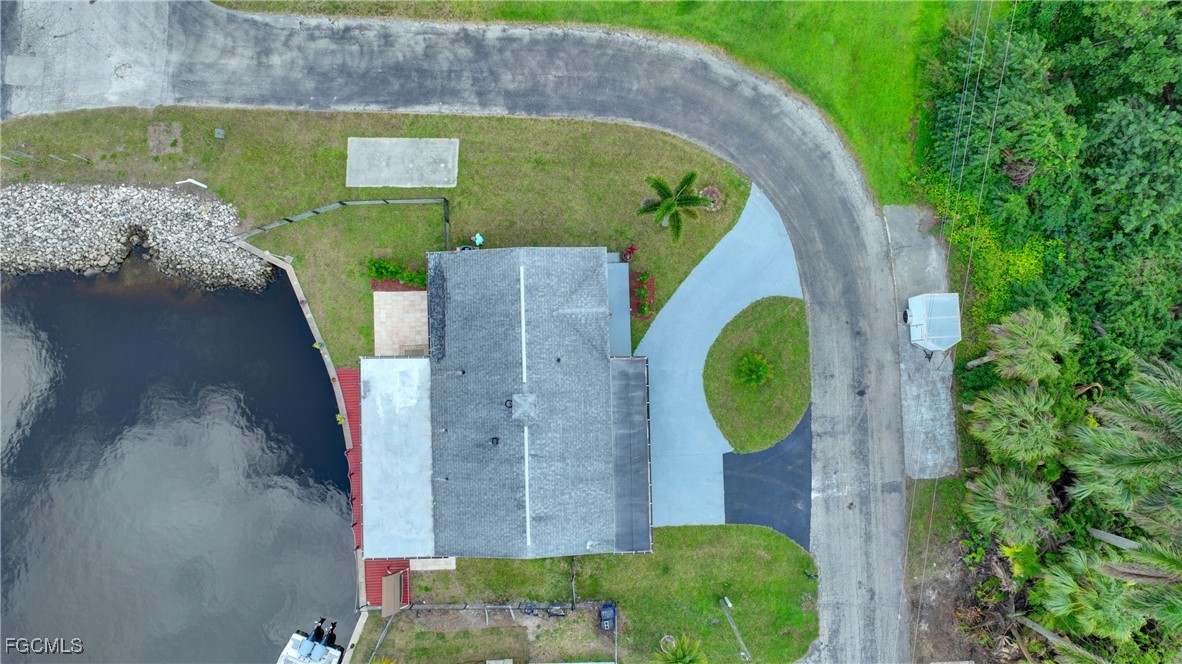 8141 Cleaves Road North Fort Myers, FL 33903 - Photo 29 of 37 an aerial view of a house with outdoor swimming pool