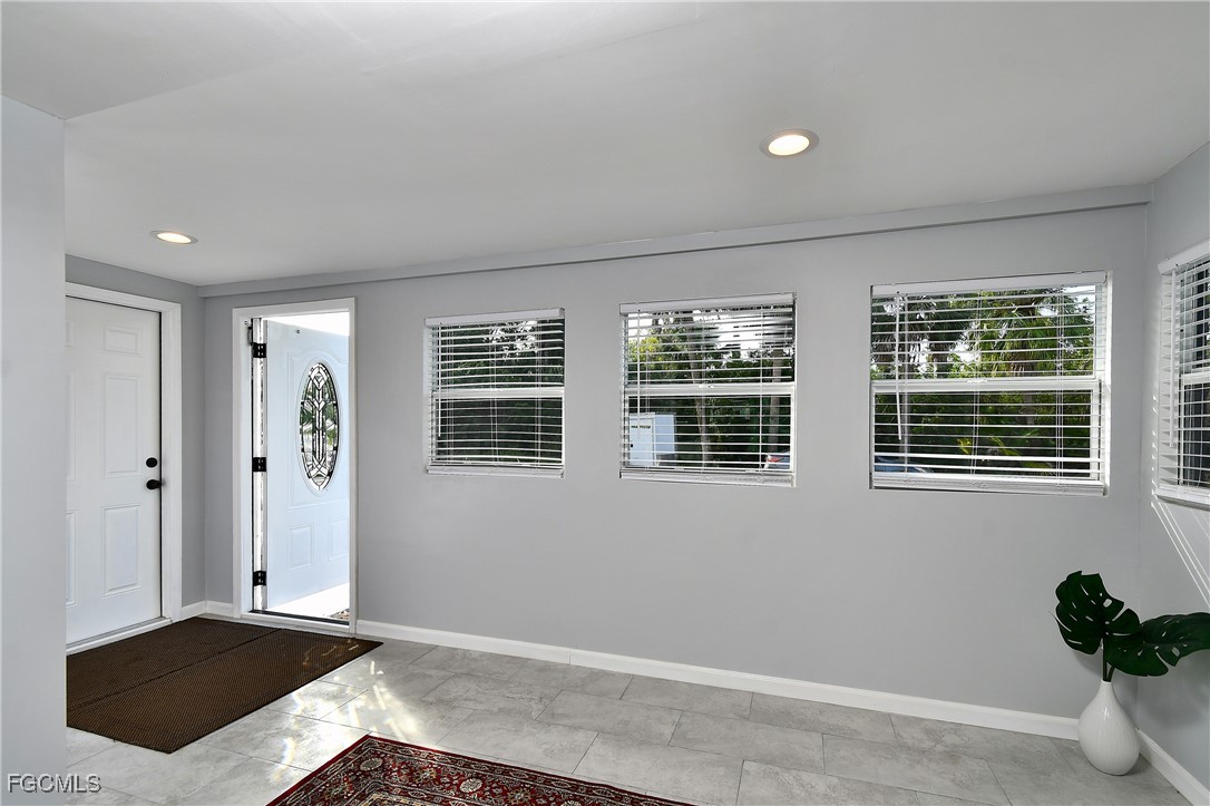 8141 Cleaves Road North Fort Myers, FL 33903 - Photo 4 of 37 a view of livingroom with window