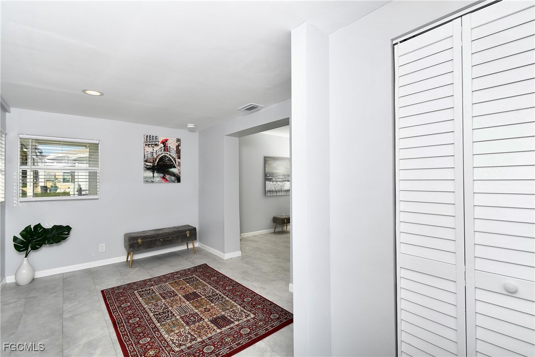 8141 Cleaves Road North Fort Myers, FL 33903 - Photo 5 of 37 a view of an empty room and a window