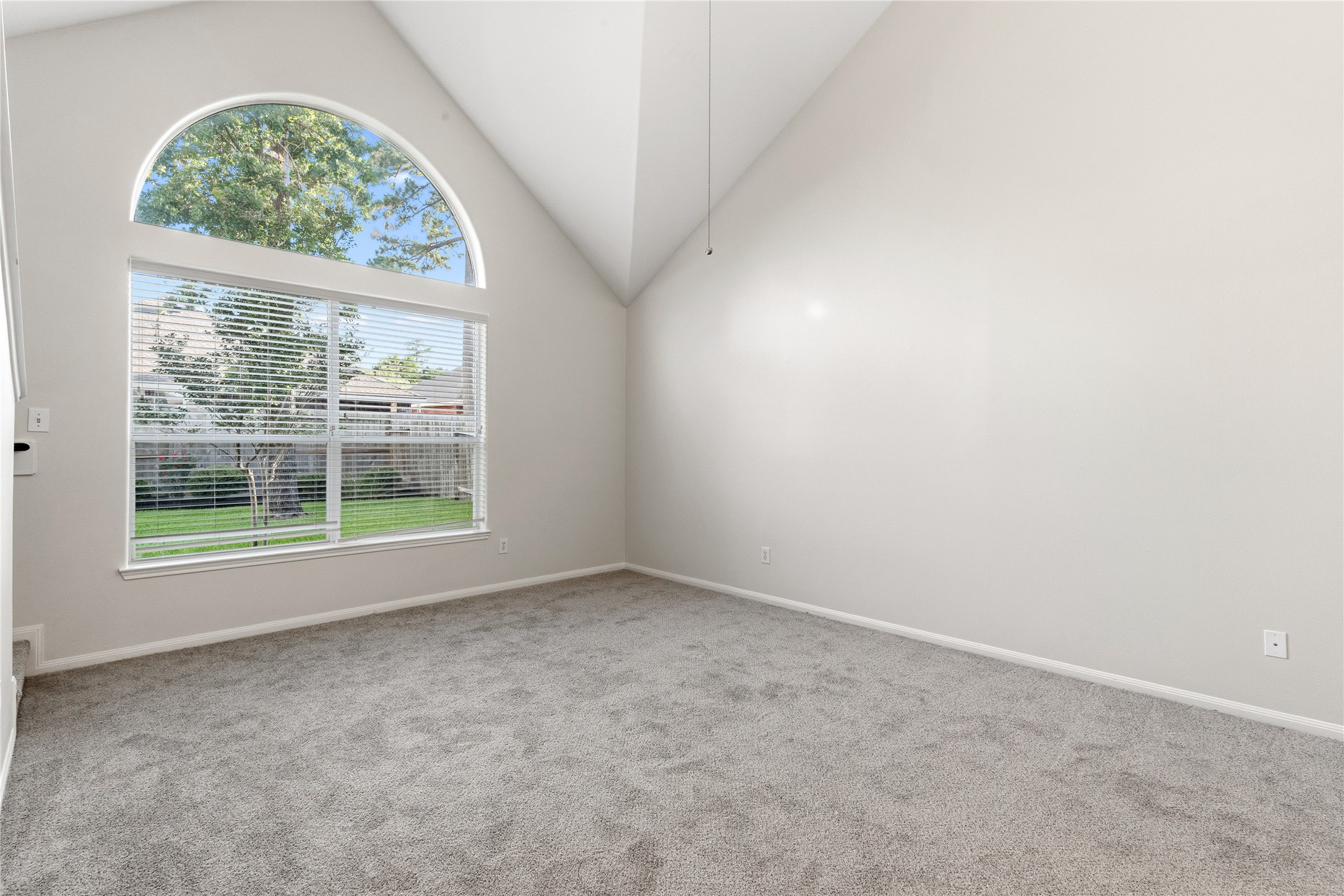 6211 Stone Hill Road Spring, TX 77389 - Photo 18 of 43 an empty room with a window