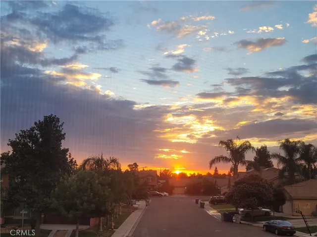 a view of a porch with a microwave and a potted plant