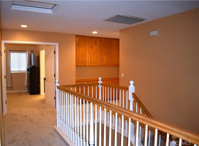a view of storage and utility room with a washer and dryer