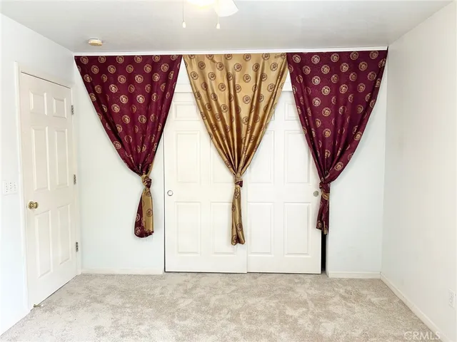 a view of a room with a large window