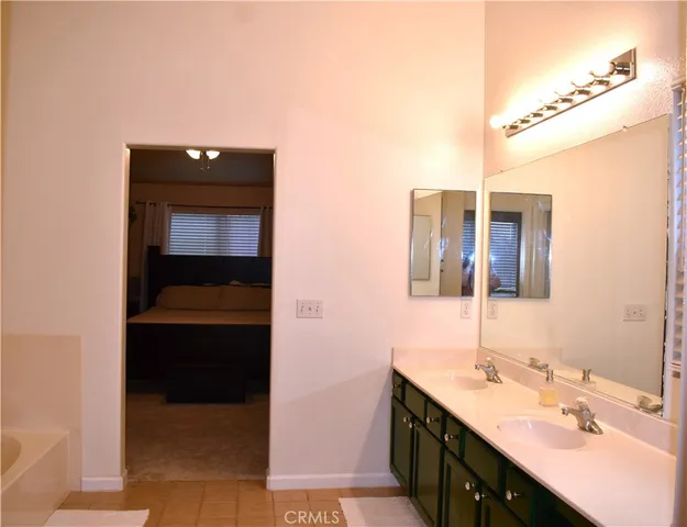 a view of entryway with a table and a chair