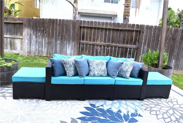 a view of a wooden floor and a yard in the back