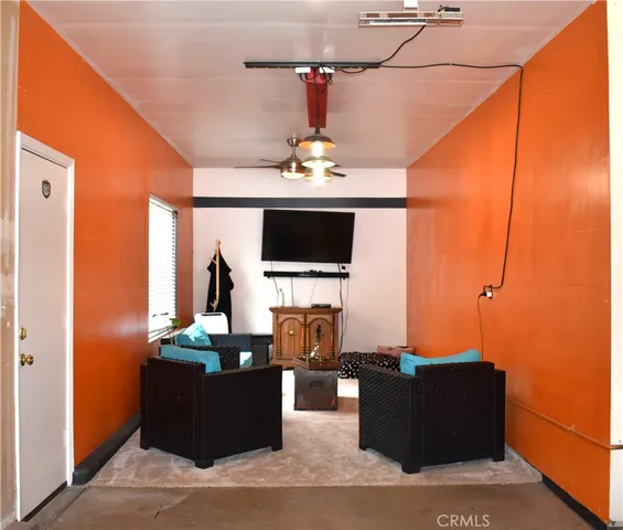 a view of brick house with a yard