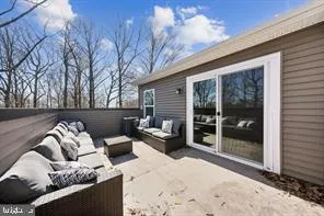 a view of a porch with furniture