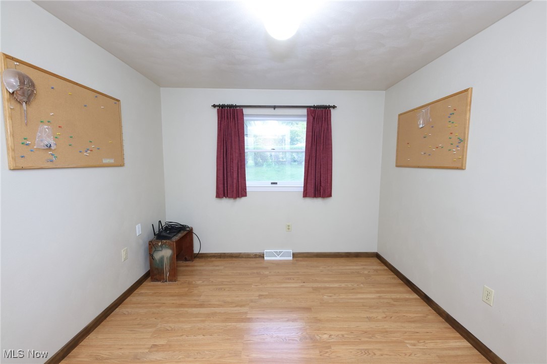 115 Carol Road Wellsburg, WV 26070 - Photo 25 of 36 Empty room featuring light wood-style flooring and baseboards