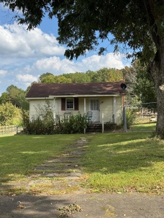 160 Tate Road Cedartown, GA 30125 - Photo 19 of 23 a front view of a house with a garden