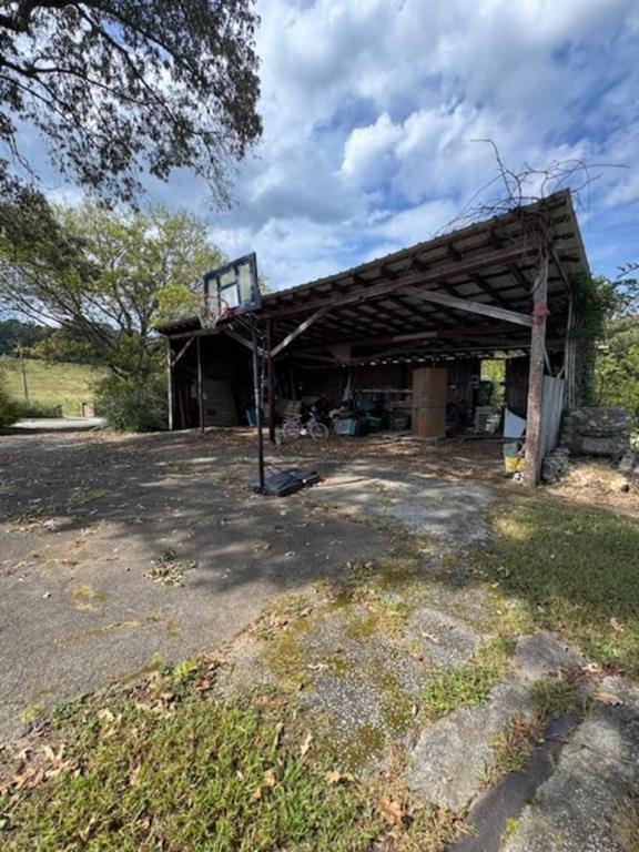160 Tate Road Cedartown, GA 30125 - Photo 20 of 23 a view of a house with backyard