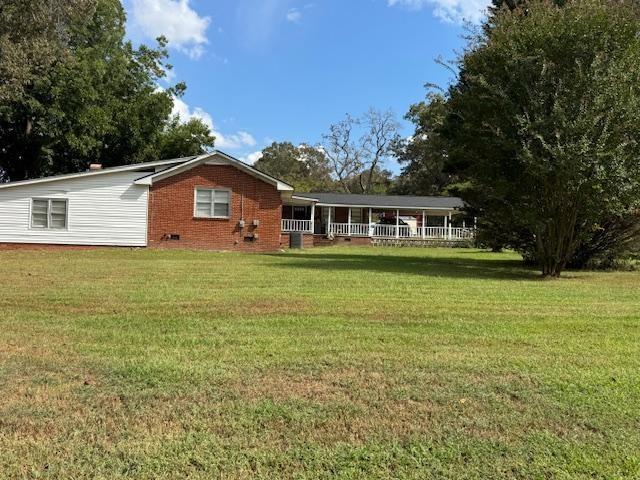 160 Tate Road Cedartown, GA 30125 - Photo 2 of 23 a view of a house with a big yard