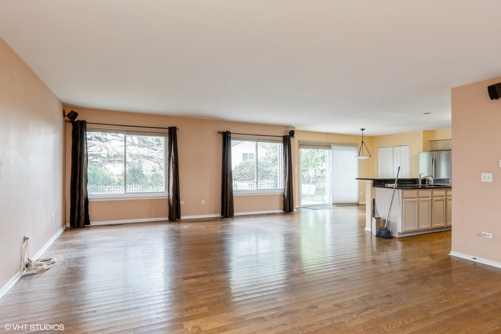 170 Willow Bend Bolingbrook, IL 60490 - Photo 4 of 6 a view of an empty room with a window and wooden floor