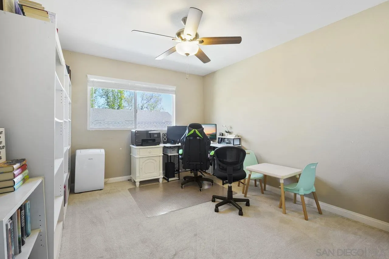 231 Blossom Way Oceanside, CA 92058 - Photo 20 of 31 a view of a workspace with furniture and a window