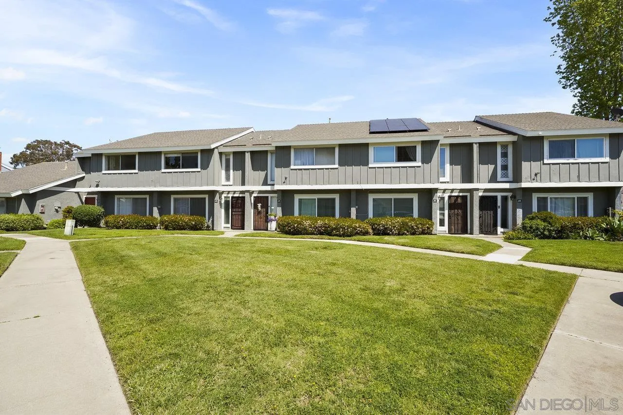 231 Blossom Way Oceanside, CA 92058 - Photo 26 of 31 a front view of building with yard