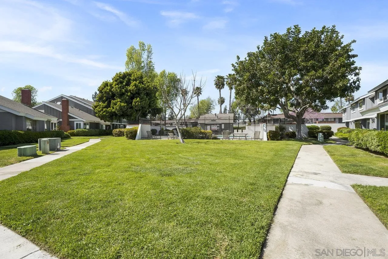 231 Blossom Way Oceanside, CA 92058 - Photo 27 of 31 a view of a house with garden and a trees