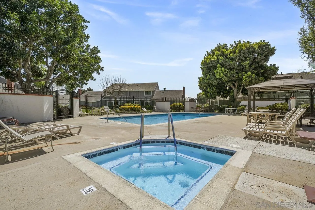 231 Blossom Way Oceanside, CA 92058 - Photo 30 of 31 a swimming pool with outdoor seating and yard