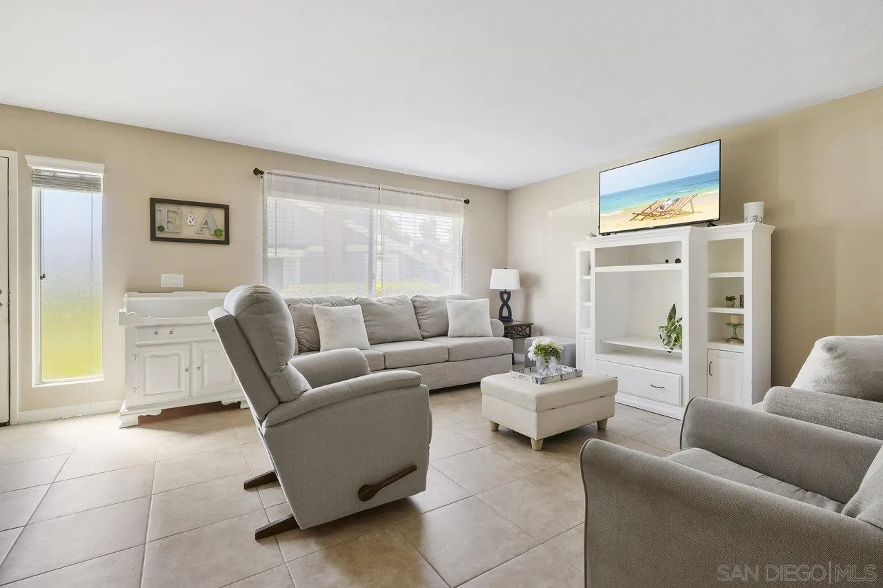231 Blossom Way Oceanside, CA 92058 - Photo 5 of 31 a living room with furniture and a window