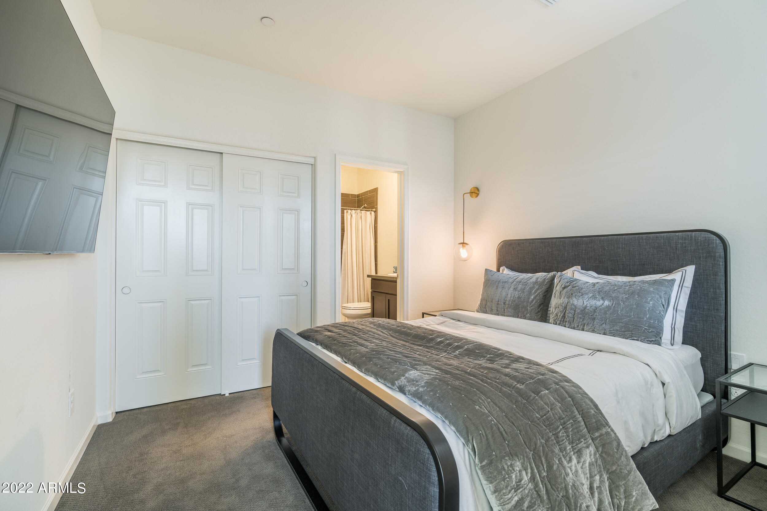 3935 East Rough Rider Road, Unit 1322 Phoenix, AZ 85050 - Photo 15 of 23 Guest King Bedroom