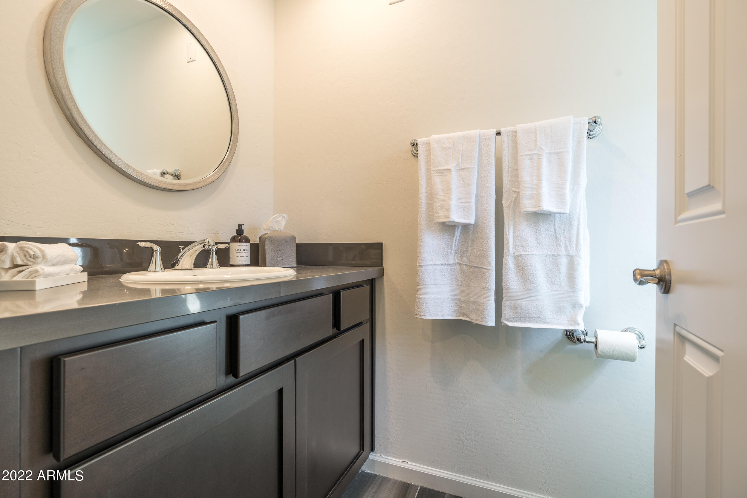 3935 East Rough Rider Road, Unit 1322 Phoenix, AZ 85050 - Photo 16 of 23 Guest Bathroom