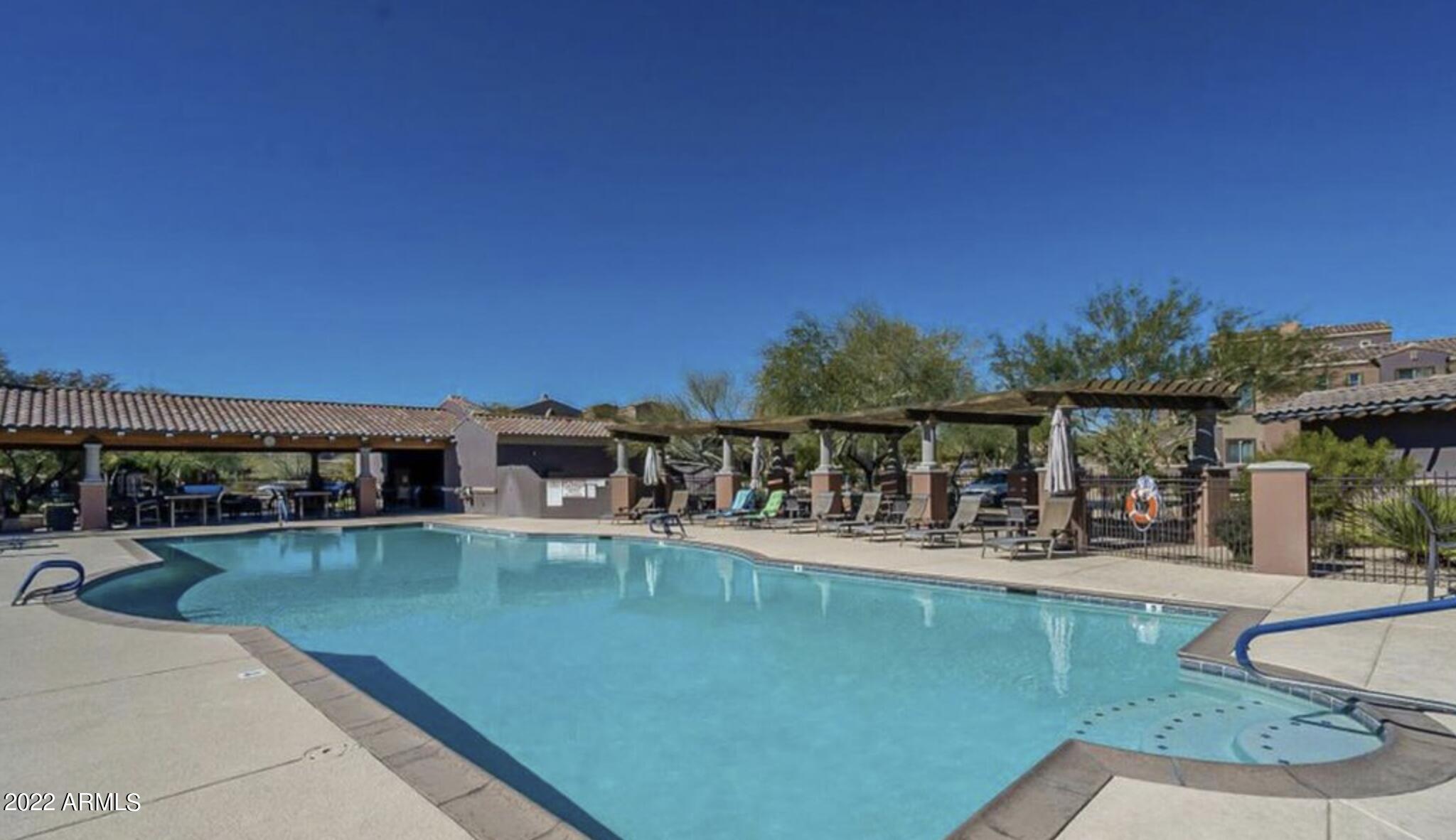 3935 East Rough Rider Road, Unit 1322 Phoenix, AZ 85050 - Photo 22 of 23 Community Heated Pool