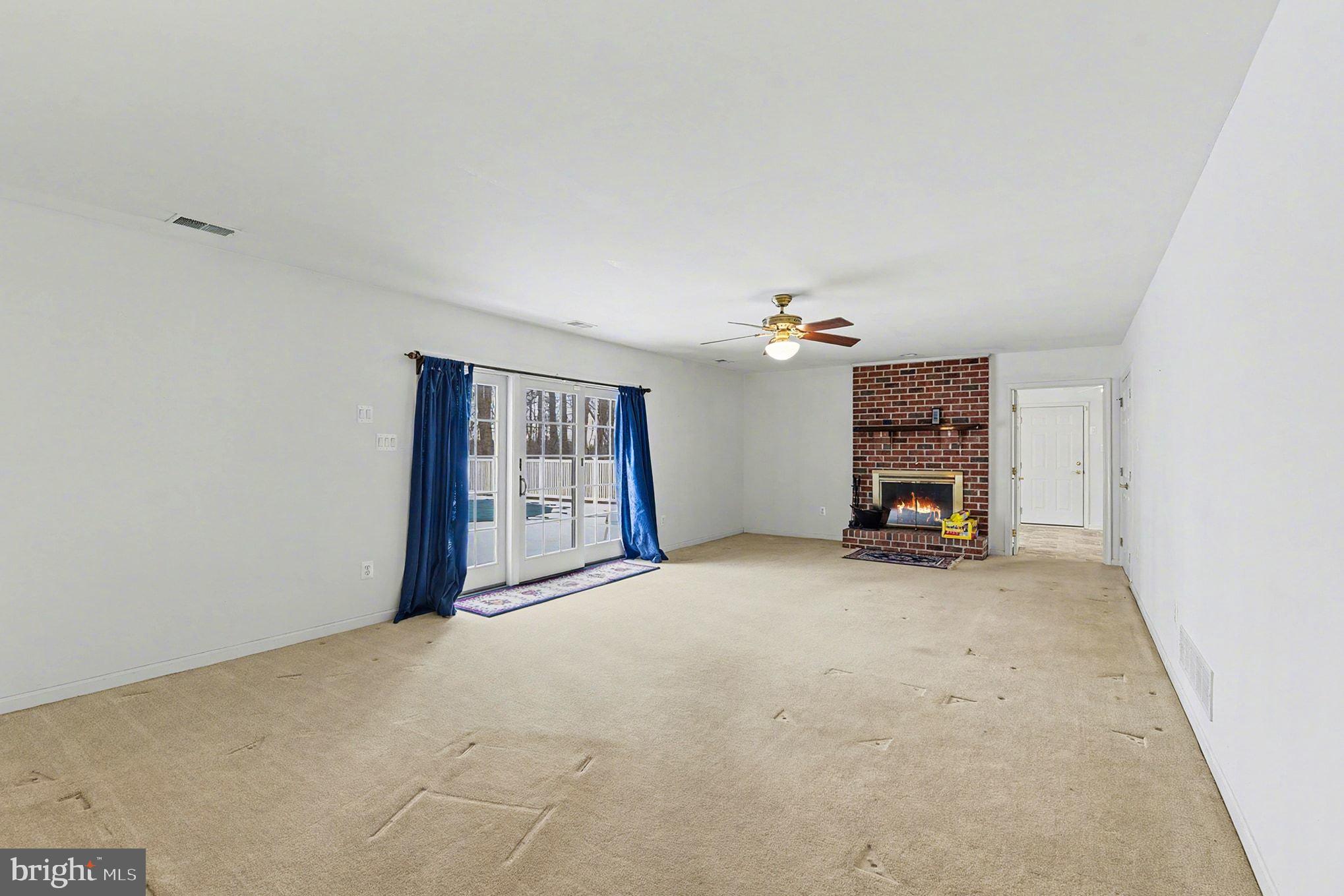 1645 Timber Summit Drive Westminster, MD 21157 - Photo 13 of 52 a view of a livingroom with a fireplace