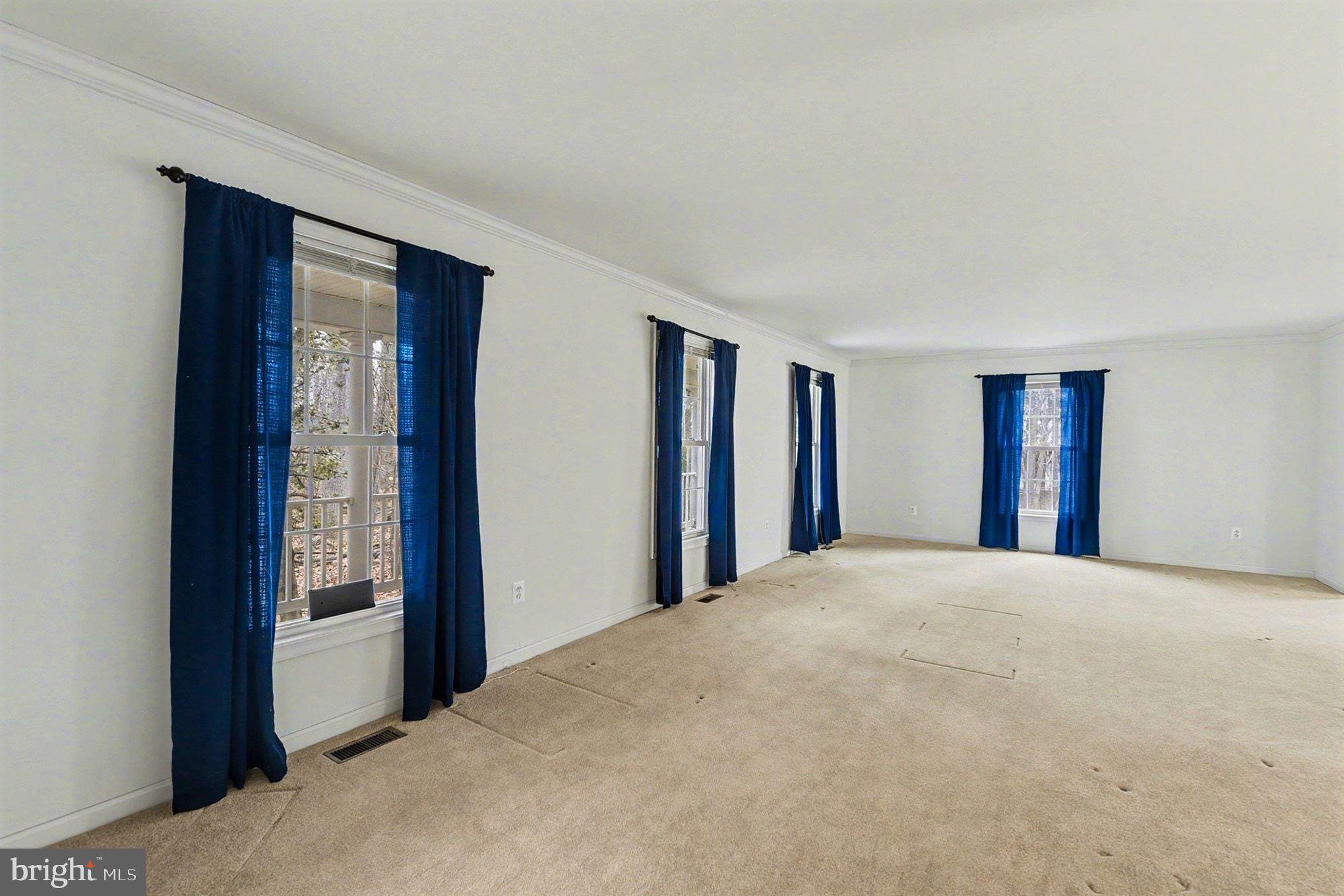 1645 Timber Summit Drive Westminster, MD 21157 - Photo 8 of 52 a view of an empty room with closet and windows