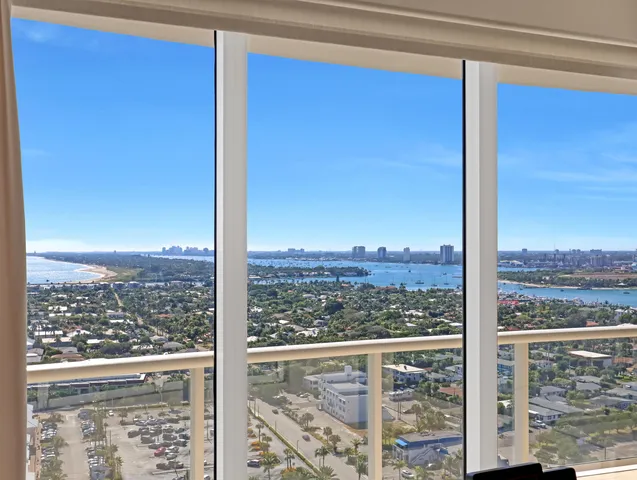 a kitchen with stainless steel appliances granite countertop a stove and a refrigerator