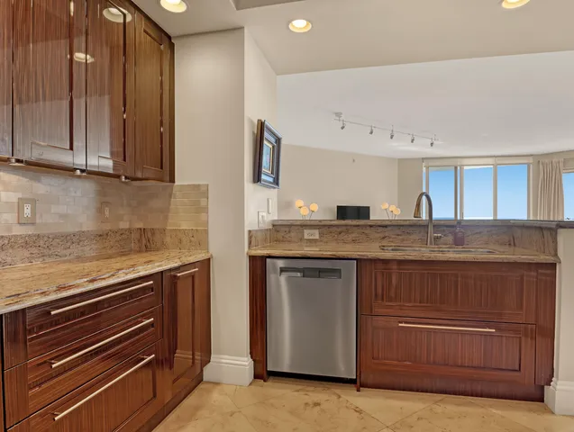 a spacious bedroom with a bed and a couch